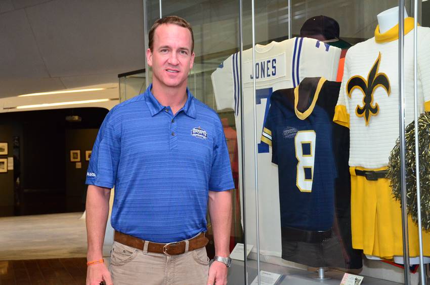 Peyton at LSHOF with Archie jersey